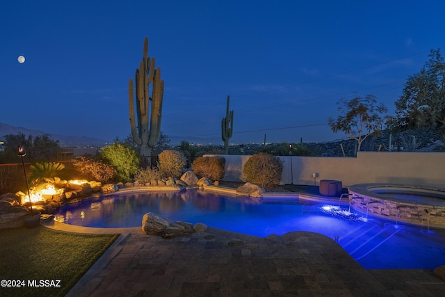 view of pool with fence private yard, a patio area, a fenced in pool, and an in ground hot tub