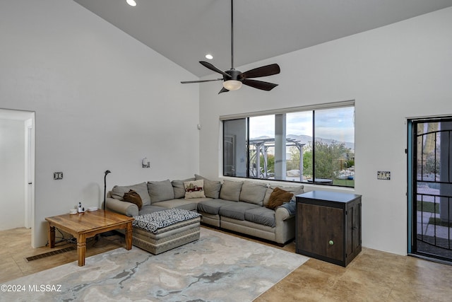 living room featuring ceiling fan, high vaulted ceiling, and recessed lighting