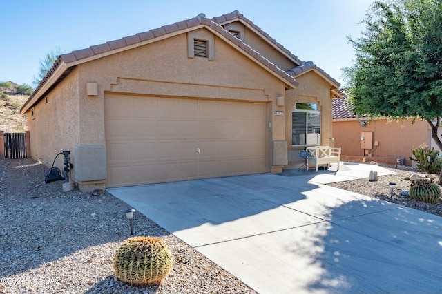 view of front of home featuring a garage