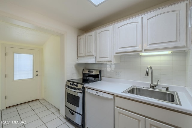 kitchen with a sink, stainless steel electric range, white cabinets, white dishwasher, and decorative backsplash