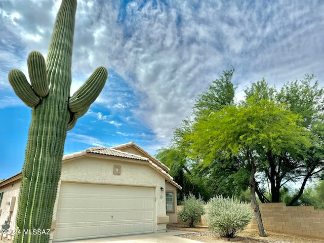 view of home's exterior with a garage