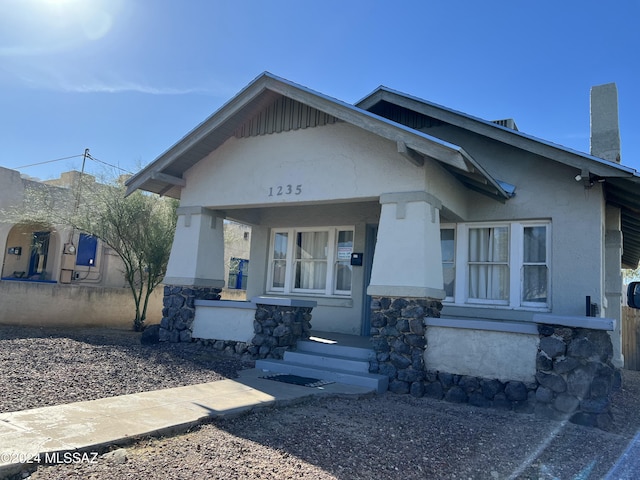 view of front of house featuring covered porch