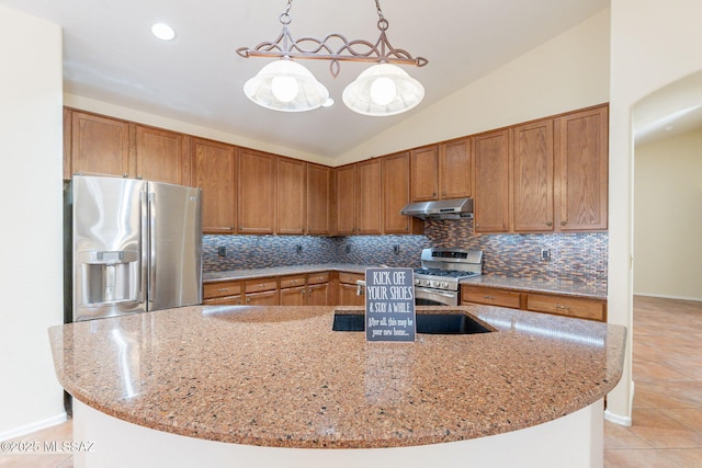 1474 N Miranda Ln, Green Valley, AZ 85614 - kitchen featuring under cabinet range hood, light stone countertops, light tile patterned floors, and appliances with stainless steel finishes
