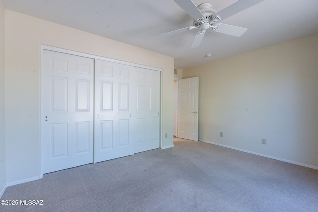 1474 N Miranda Ln, Green Valley, AZ 85614 - unfurnished bedroom featuring a closet, a ceiling fan, visible vents, carpet, and baseboards