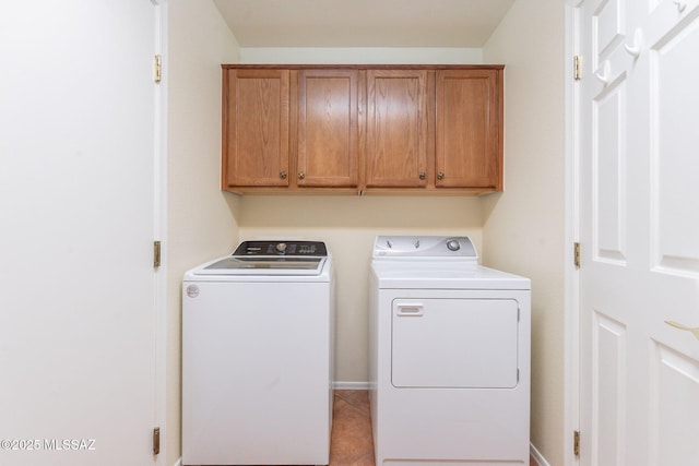 1474 N Miranda Ln, Green Valley, AZ 85614 - laundry room featuring washing machine and clothes dryer and cabinet space