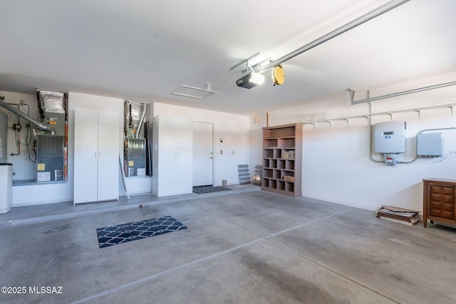 1474 N Miranda Ln, Green Valley, AZ 85614 - garage with a garage door opener, heating unit, and water heater