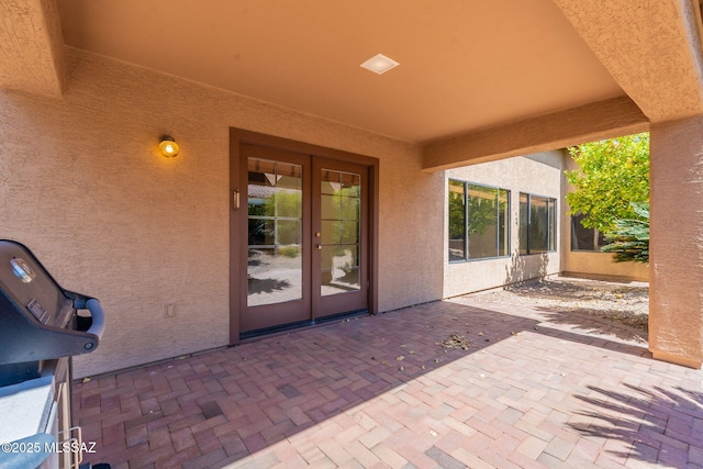1474 N Miranda Ln, Green Valley, AZ 85614 - view of patio / terrace featuring french doors