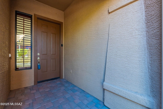 1474 N Miranda Ln, Green Valley, AZ 85614 - doorway to property with stucco siding