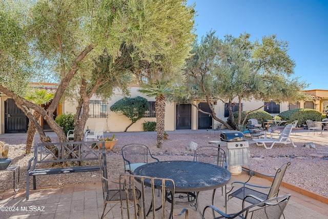 view of patio / terrace with grilling area and outdoor dining area