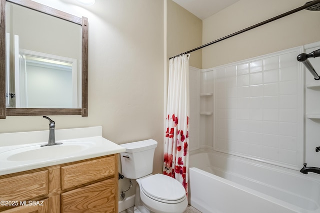 full bathroom with shower / tub combo with curtain, vanity, and toilet