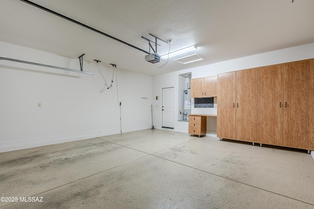 garage featuring a garage door opener and gas water heater