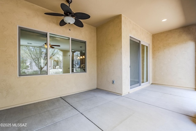 view of patio / terrace featuring ceiling fan