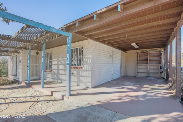 exterior space with a carport