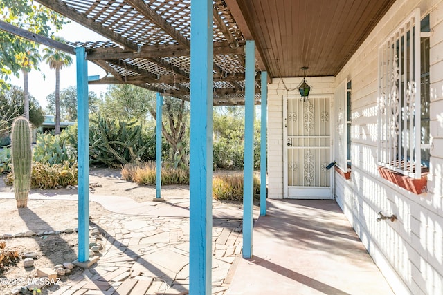 view of patio featuring a pergola