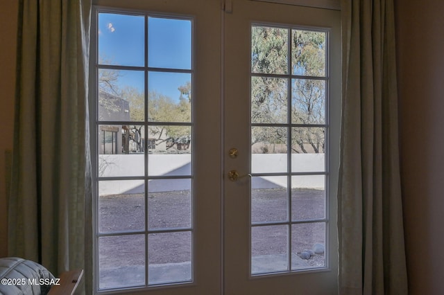 entryway featuring french doors