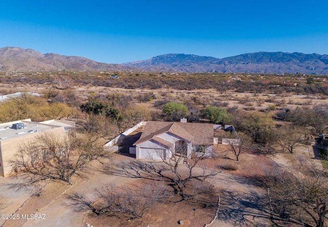 drone / aerial view featuring a mountain view