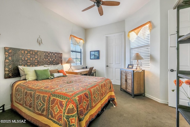 carpeted bedroom featuring a ceiling fan and baseboards