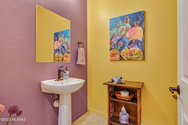 bathroom with baseboards