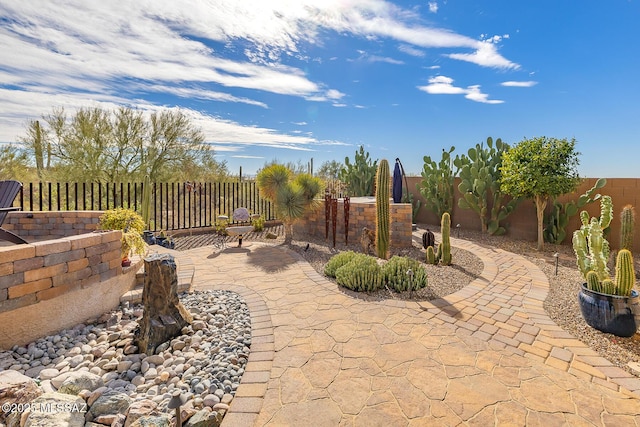 view of patio with a fenced backyard