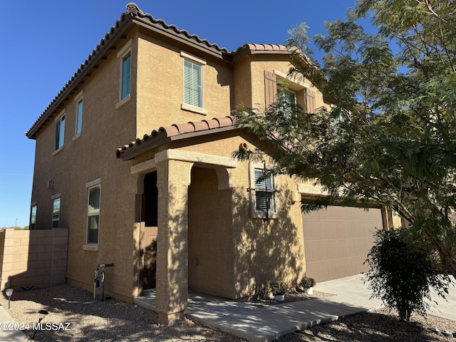 view of front of home featuring a garage