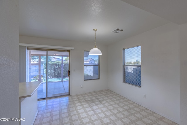 view of unfurnished dining area