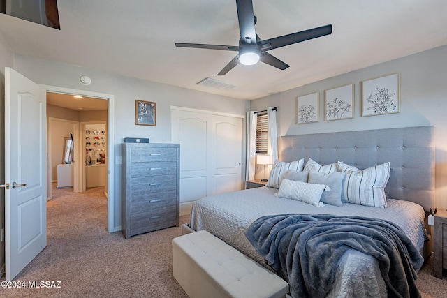 bedroom featuring carpet, a closet, and ceiling fan