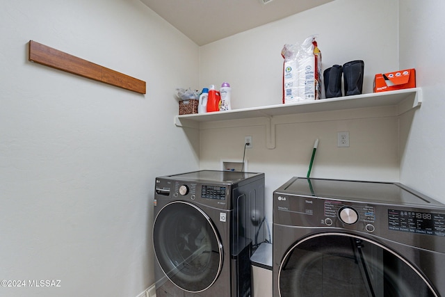 laundry area featuring separate washer and dryer