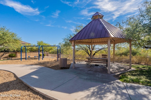 view of property's community featuring a playground