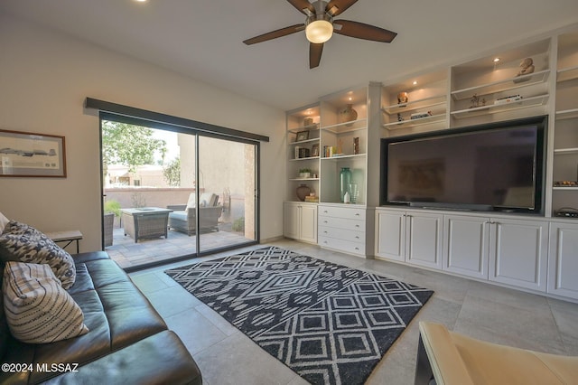 living room with ceiling fan and light tile patterned floors