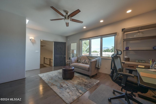 office space with dark wood-type flooring and ceiling fan