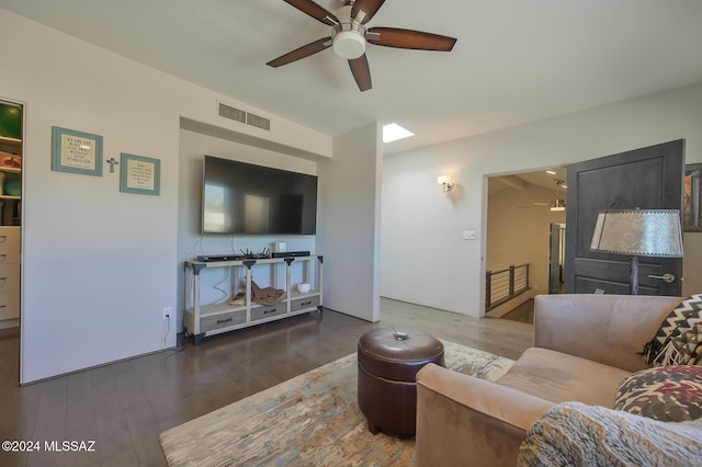 living room featuring dark wood-type flooring