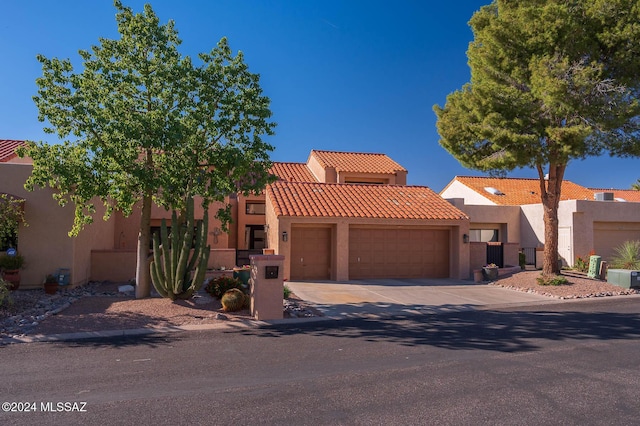 view of front of property with a garage