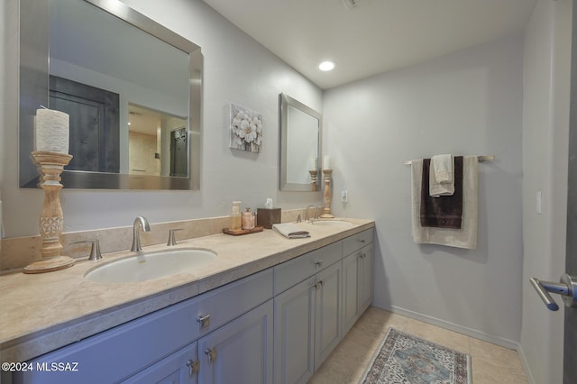 bathroom featuring vanity and tile patterned flooring