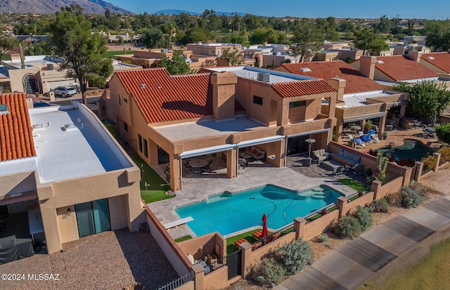 drone / aerial view featuring a mountain view