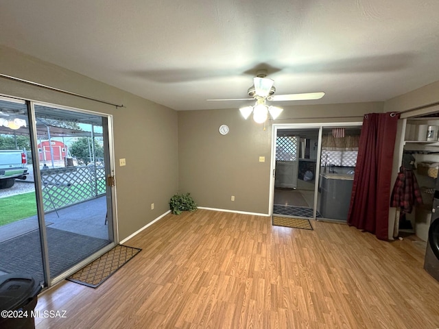 interior space with ceiling fan and light hardwood / wood-style floors