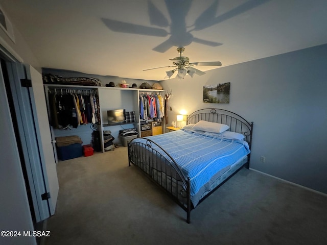 bedroom featuring carpet, a closet, and ceiling fan