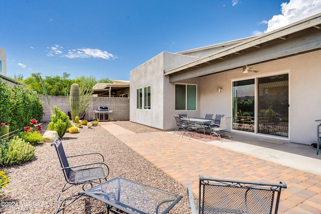 view of patio / terrace featuring grilling area and ceiling fan