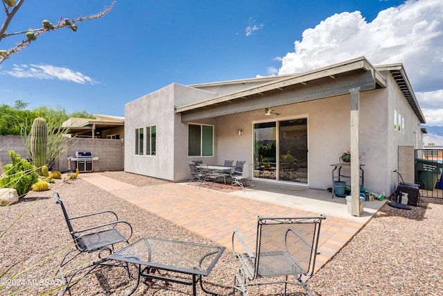 back of property featuring a patio area