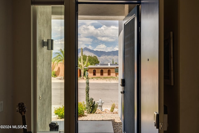 doorway featuring a mountain view