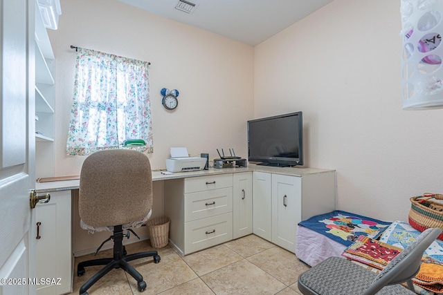 home office featuring light tile patterned flooring