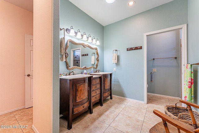 bathroom with vanity and tile patterned floors