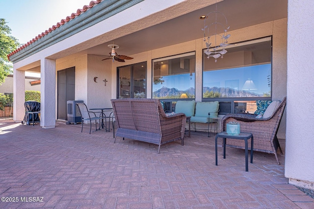 view of patio / terrace featuring outdoor lounge area and ceiling fan