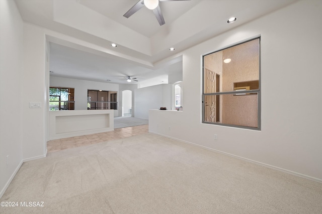 unfurnished living room with recessed lighting, baseboards, ceiling fan, and carpet floors