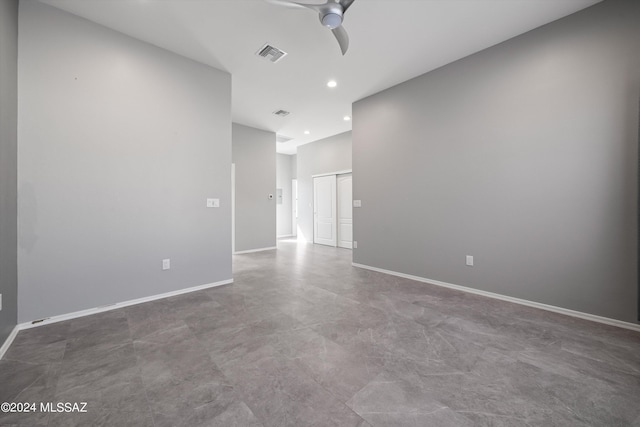 spare room featuring recessed lighting, visible vents, ceiling fan, and baseboards