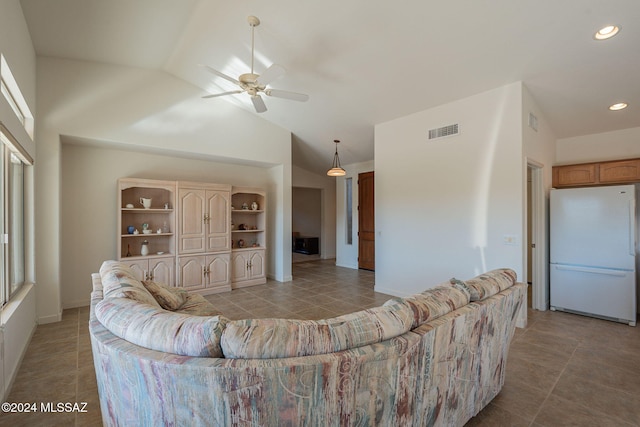 living room with ceiling fan, light tile patterned floors, and high vaulted ceiling