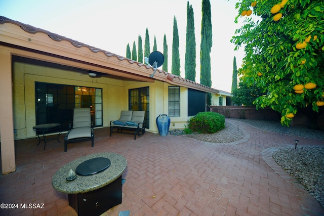 view of patio with a ceiling fan