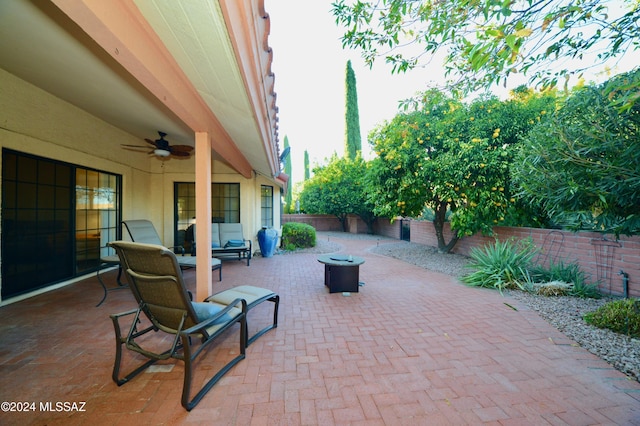 view of patio / terrace with a fenced backyard and a ceiling fan