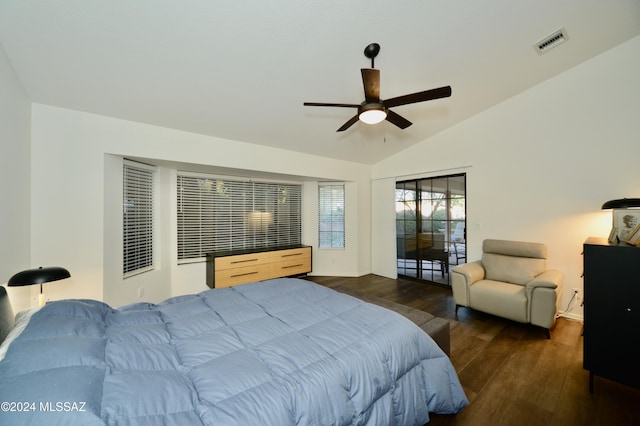 bedroom featuring lofted ceiling, ceiling fan, dark wood-style flooring, and visible vents