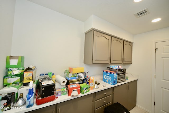 kitchen featuring visible vents, light countertops, and recessed lighting