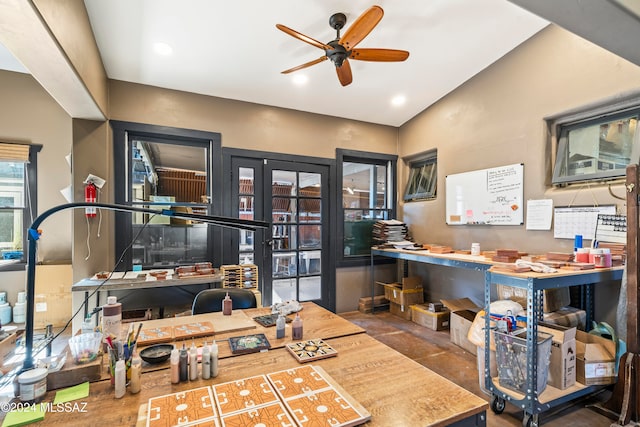 office space with a workshop area and ceiling fan